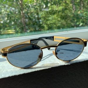 80s Vintage Versace round glasses. Black and gold